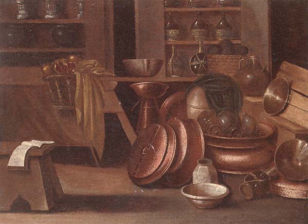 A Kitchen still life of utensils and fruit in a basket,shelves with wine caskets beyond